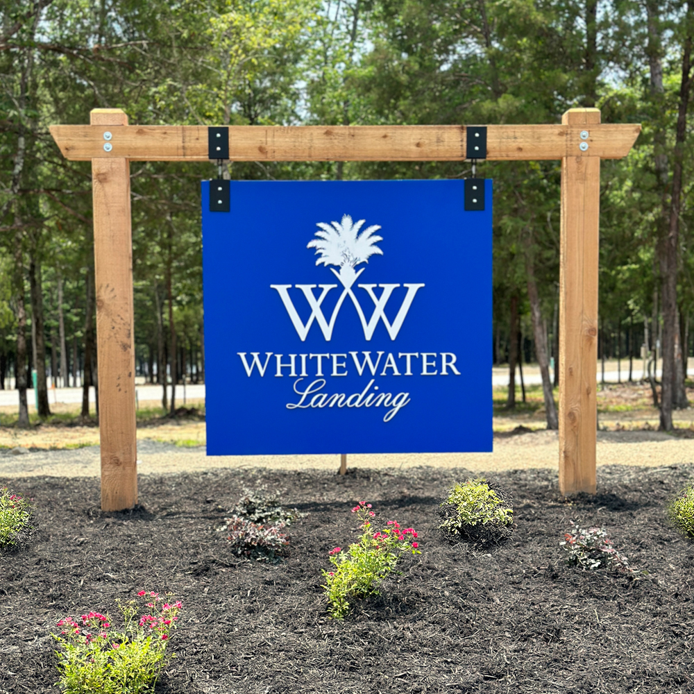 Welcome to WhiteWater Landing with Landscaped Community Signs Flanking the Entrance